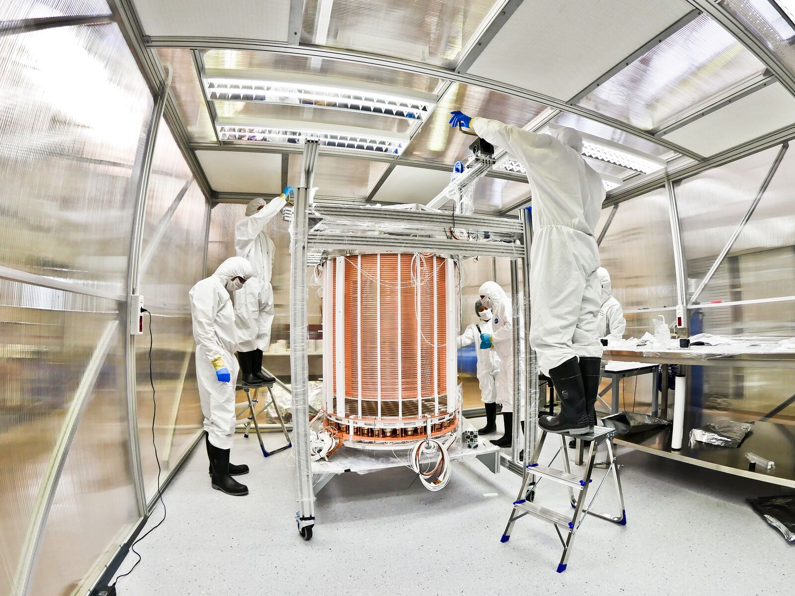 Scientists assemble the XENON1T dark matter detector in the Gran Sasso Underground Laboratory in Italy. UChicago physicist Luca Grandi and his research group played a key role in preparing and assembling the xenon detector.  Courtesy of XENON1T Collaboration